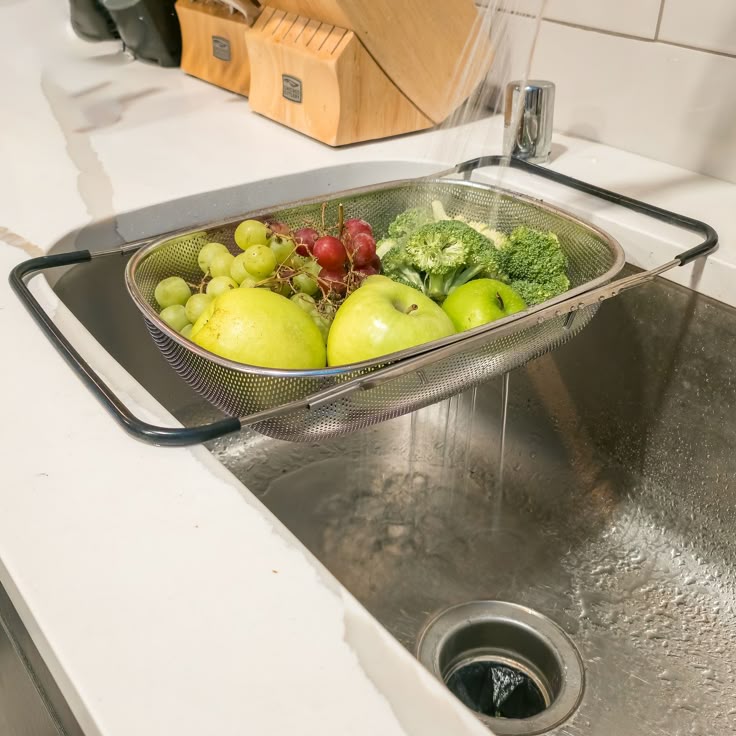Stainless steel over-the-sink colander